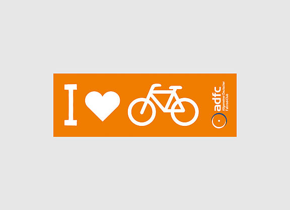 Aufkleber orange, lang für die Fahrradstange, mit weißer Schrift und Symbolen, großes i, Herz, Fahrrad, sowie das ADFC-Logo